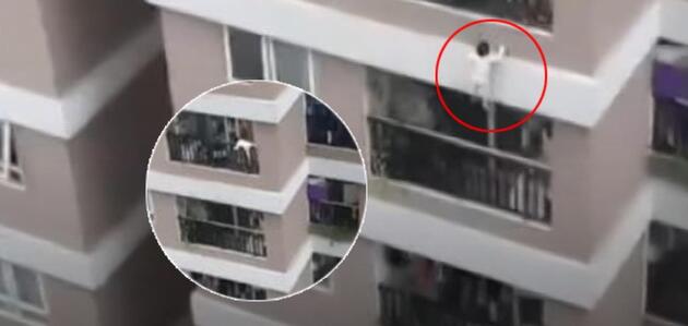 12. kattan düşen küçük kızı kurye kurtardı