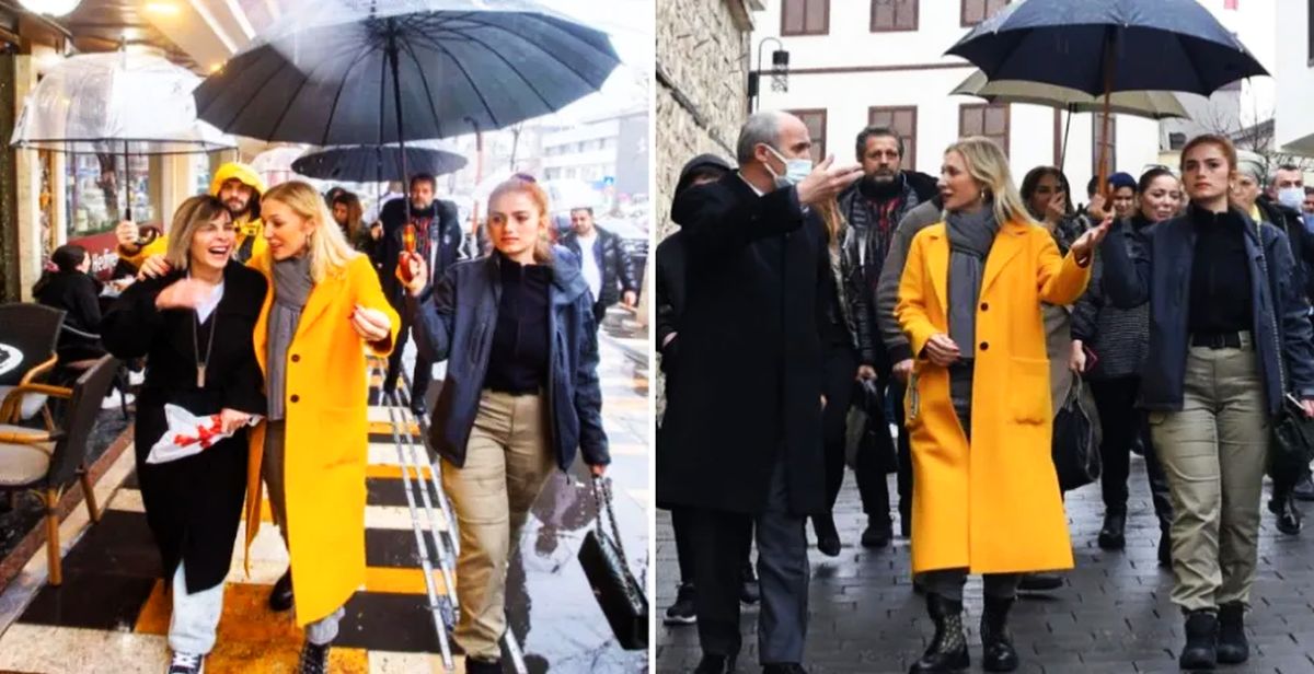 Kültür Bakanı'nın eşi Pervin Ersoy, polise şemsiye tutturup çantasını taşıttı! Sosyal medyadan tepki yağdı!